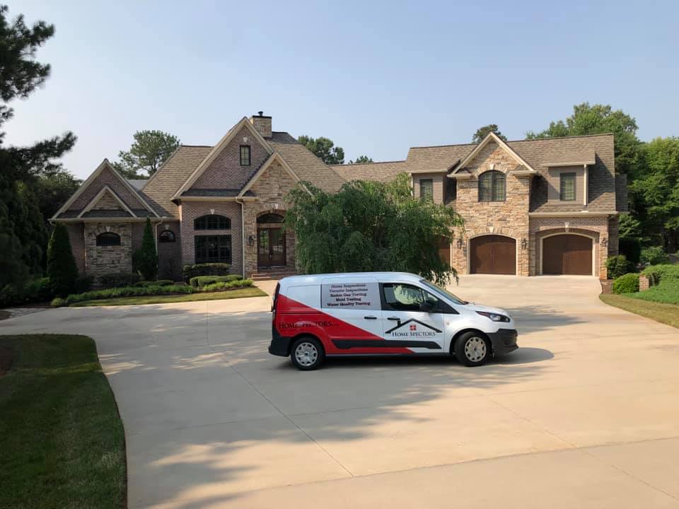 Home Spectors home inspector conducting a residential inspection