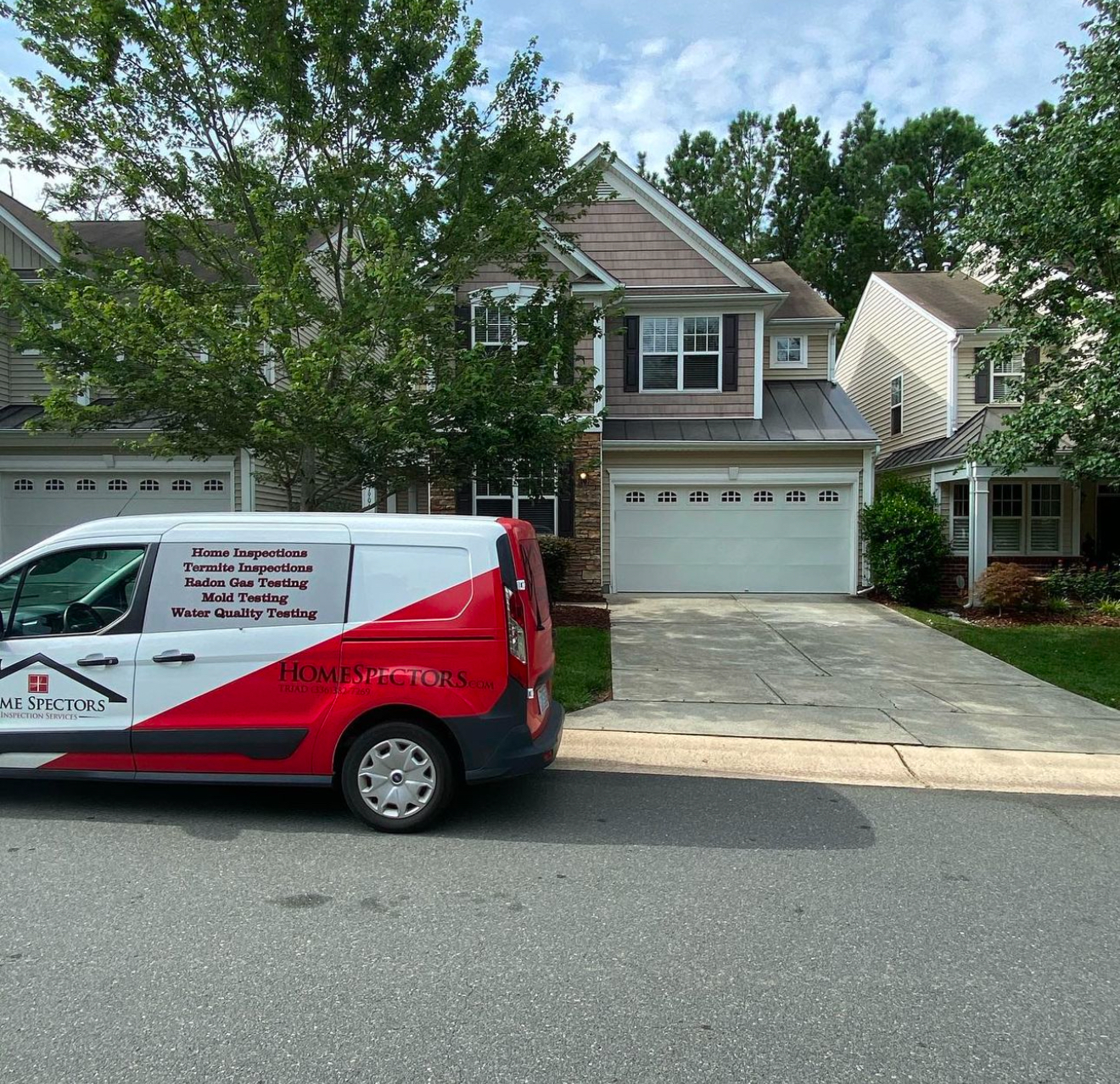 Home Spectors inspection van parked in front of a home in Greensboro, NC.