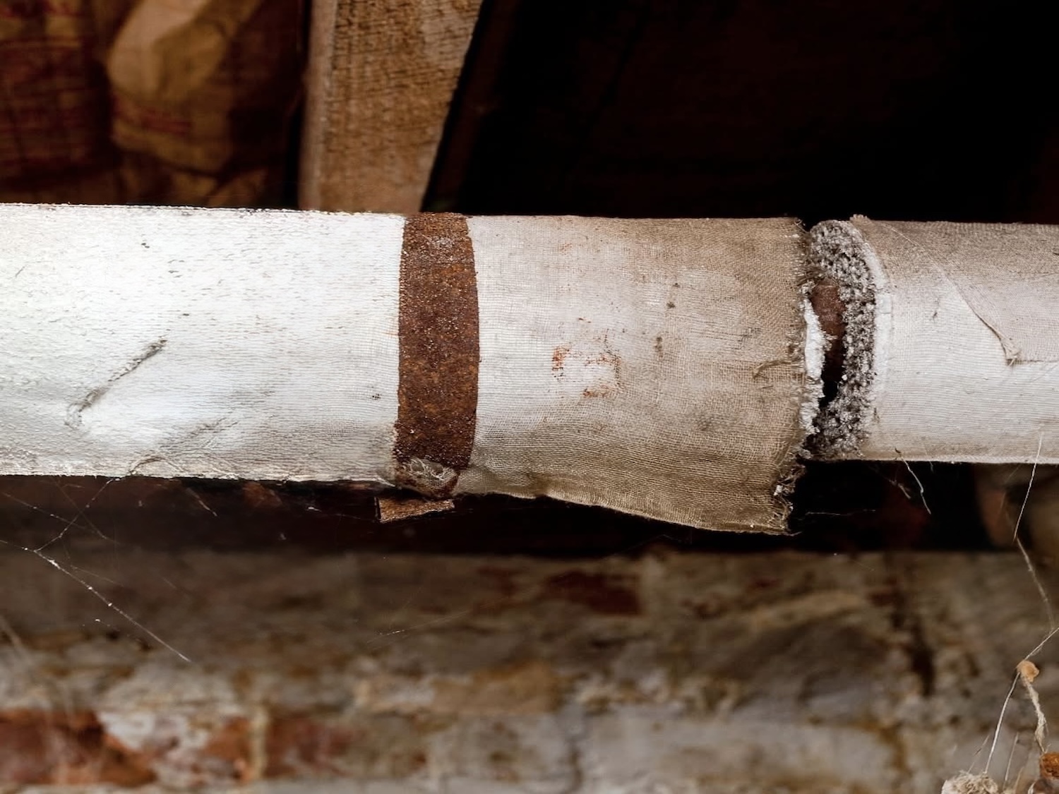 Asbestos pipe insulation identified during Raleigh asbestos testing by Home Spectors.