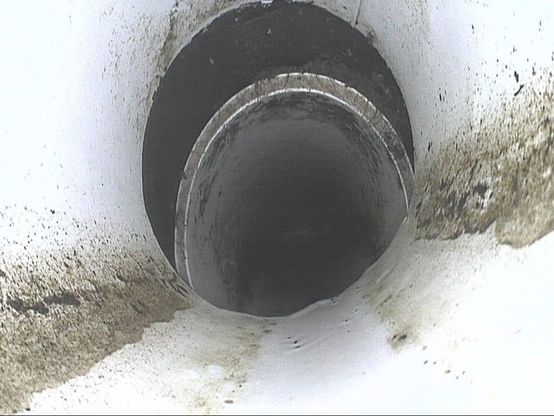 Misaligned sewer pipe joint discovered during a home inspection in Raleigh, NC – Homespectors ensuring plumbing integrity.